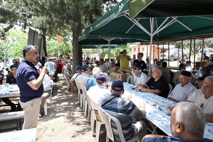 'Babalar G�n�'nde anlaml� bulu�ma: �ehit aileleri ve gaziler Dar�sekisi'nde a��rland�